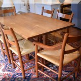F27. Charles Shackleton cherry trestle table. 30”h x 54”w x 35”d 
